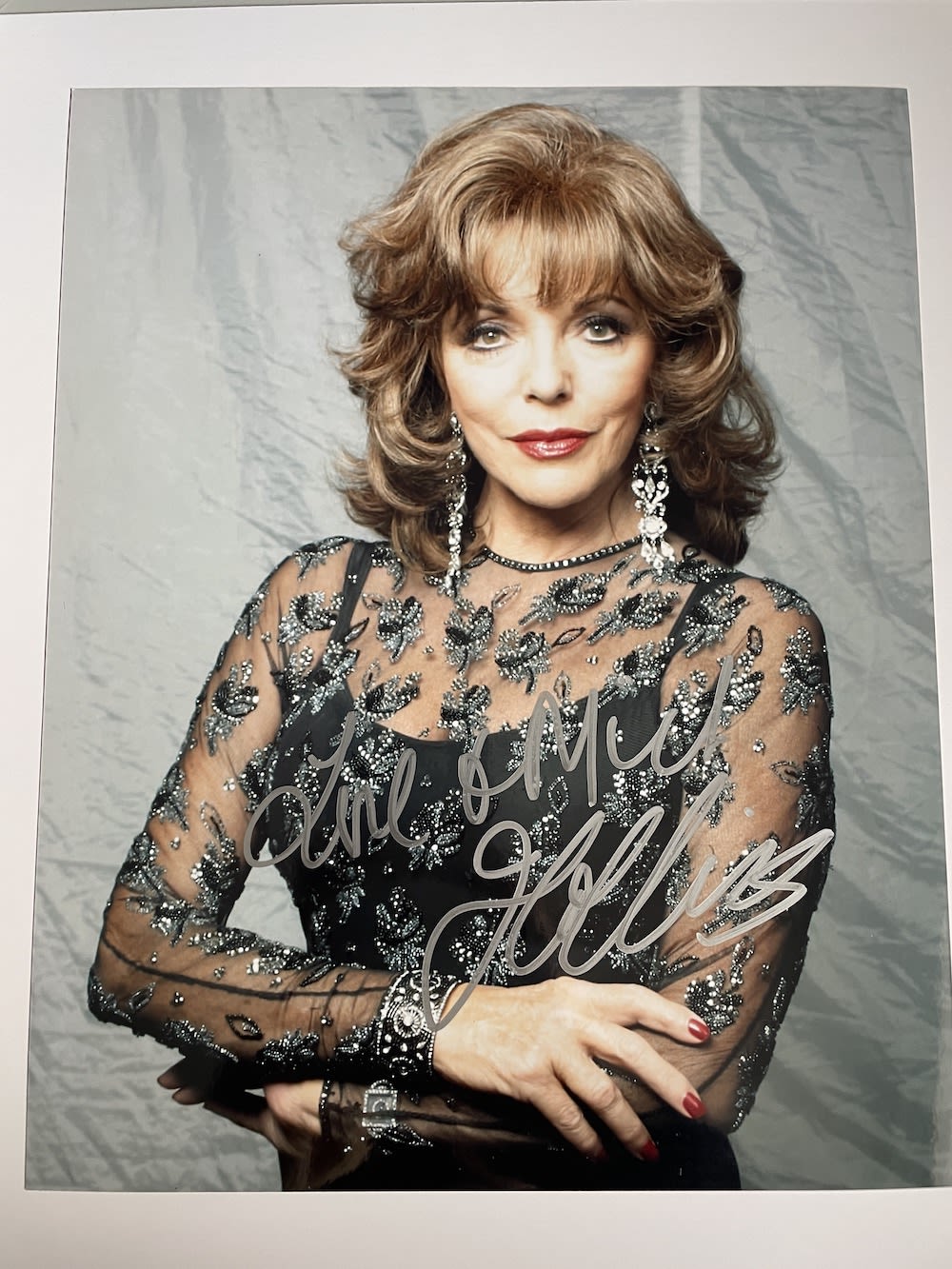Lot 144: Joan Collins Legendary British Actress 10x8 inch signed...