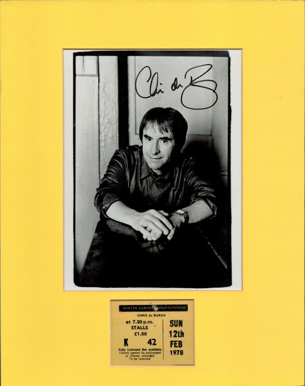 Lot 185: Mounted Signature of Chris de Burgh with black...