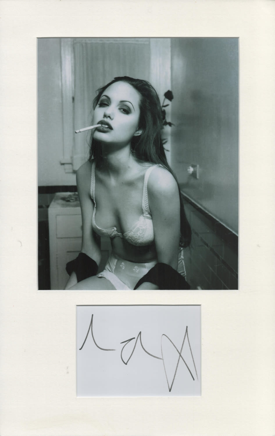 Lot 219: Angelina Jolie signed Autograph black and white photo...