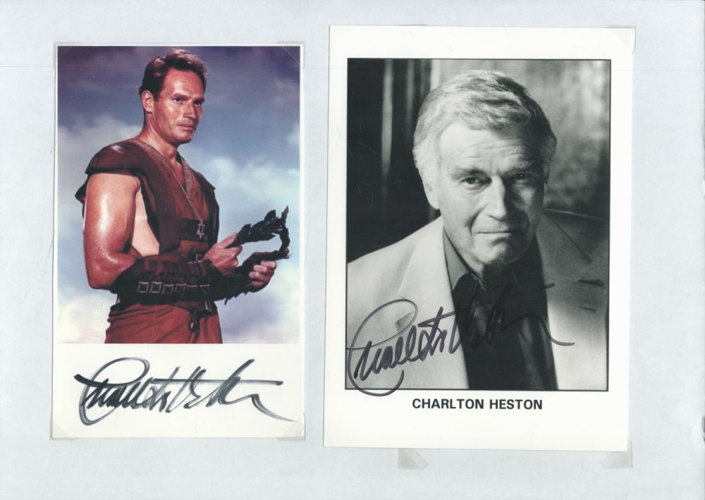 Lot 434: Charlton Heston 2 x Signed Photos, colour approx...