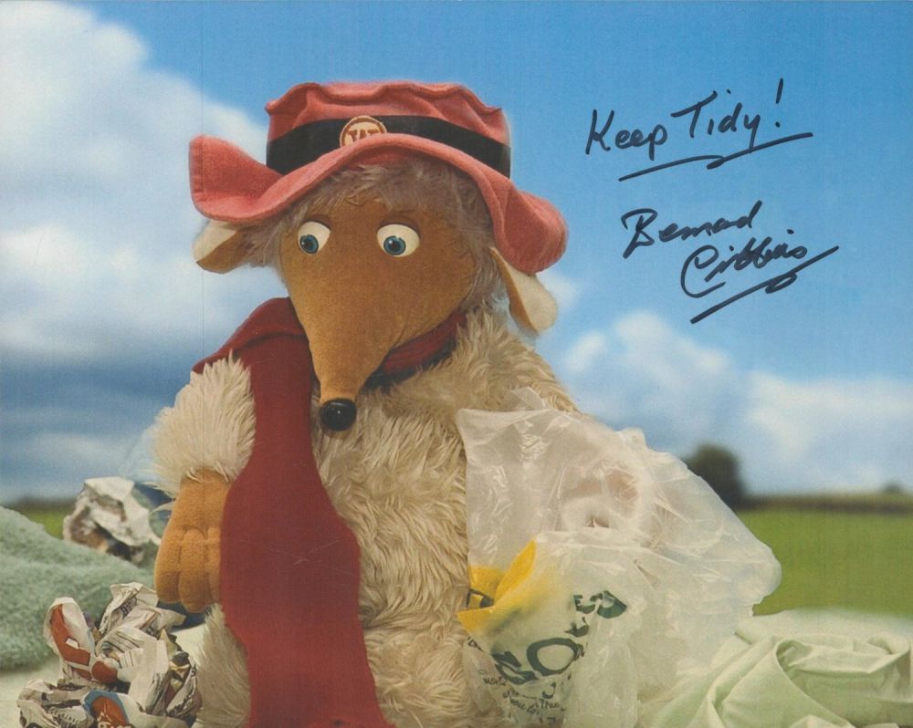 Lot 701: The Wombles. 8x10 photo signed by actor Bernard...