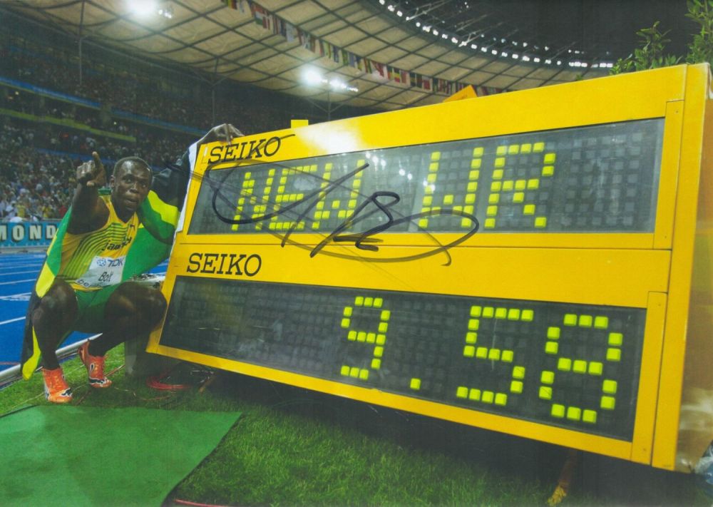 Lot 151: Athletics Usain Bolt signed 12x8 inch colour photo....
