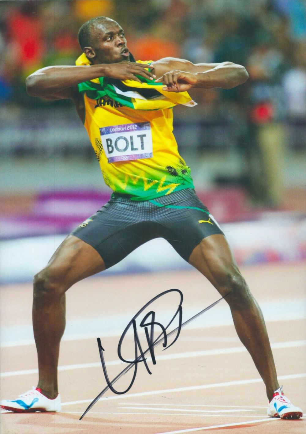 Lot 152: Athletics Usain Bolt signed 12x8 inch colour photo....