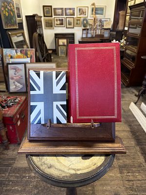 pair of small photo albums. contains postcards showing early silent film stars, biblical 