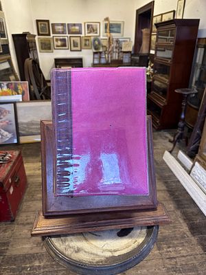 Pink photo album. this album contains seasonal/greeting postcards and vintage tourists postcards