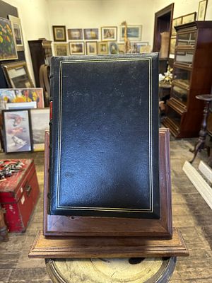 Black photo album. this album contains vintage tourist and early silent film star postcards