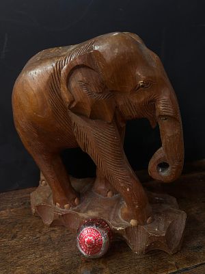Characterful Wooden Elephant. Cracking toothless elephant standing 31cm tall at highest point.