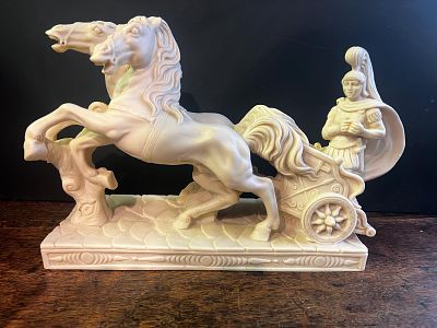 Vintage Italian-made resin sculpture. Measuring almost 12" in length depicting a Roman warrior 