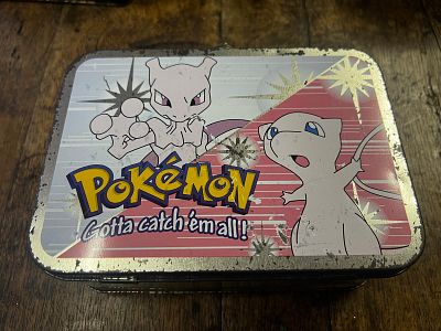 Box of Pok&eacute;mon Cards - can you find treasure?. Pok&eacute;mon cards are collectible trading cards based 