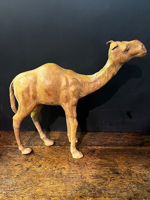 Vintage Liberty Of London Leather Camel . Measures 11" tot he top of the hump. 
Omersa created 