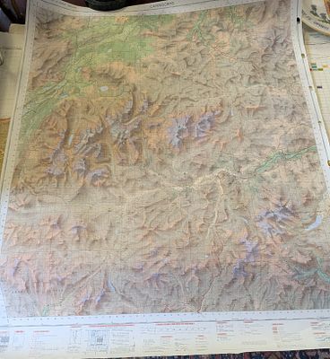 detailed topographic map of the Cairngorms National Park in Scotland. Design: The map features 