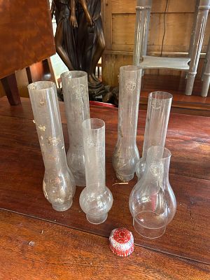 Another lot of antique glass oil lamp chimneys. Also known as lamp globes or hurricanes, which 