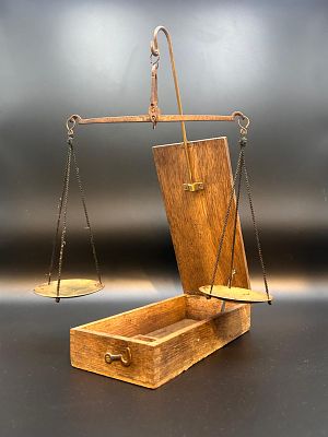 Cased traveling set of apothecary or gold balance scales. 19th-century, featuring brass pans/. 
