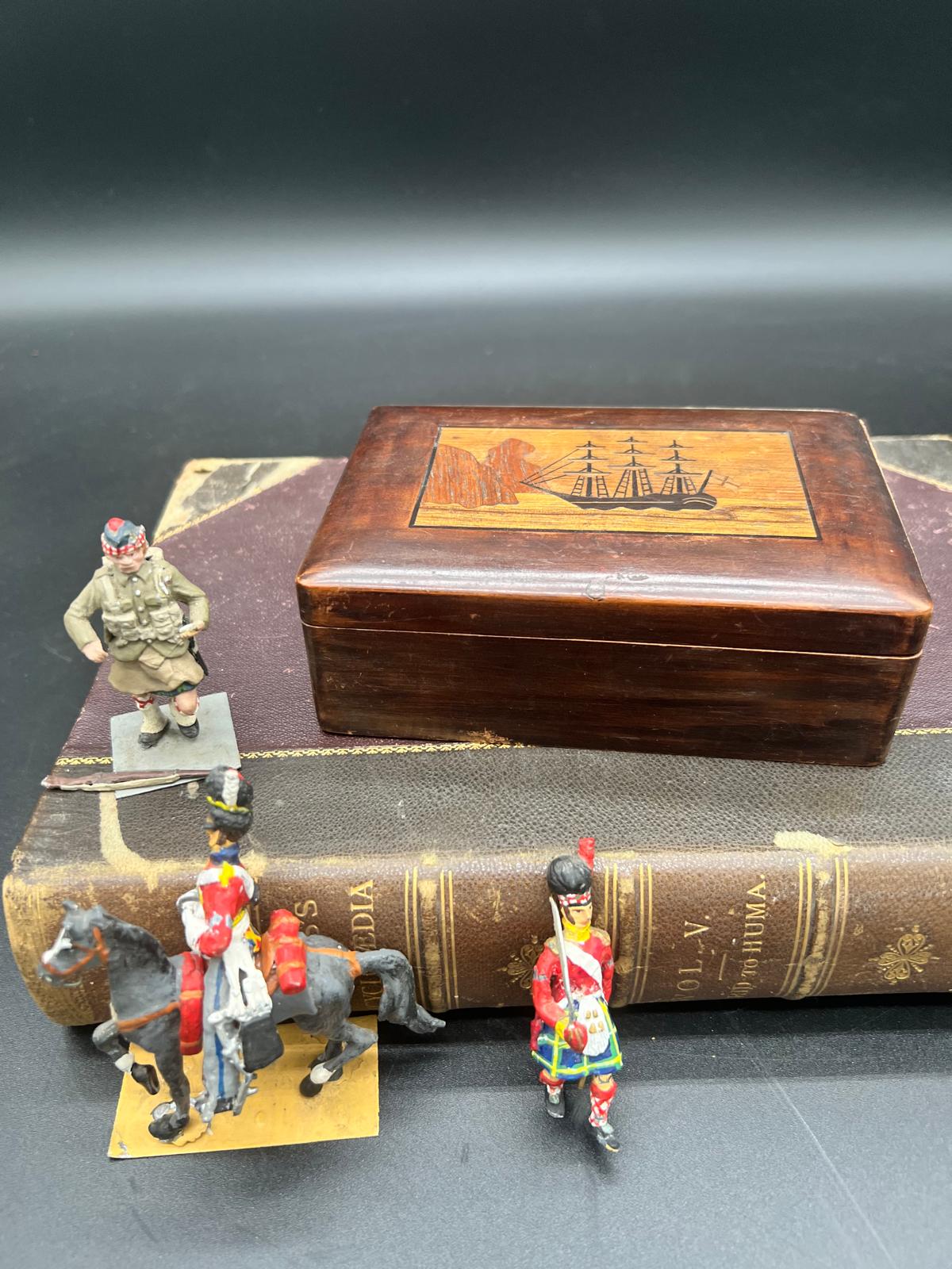 A Group of Britains Metal Toy Soldiers with Inlaid Wooden Box