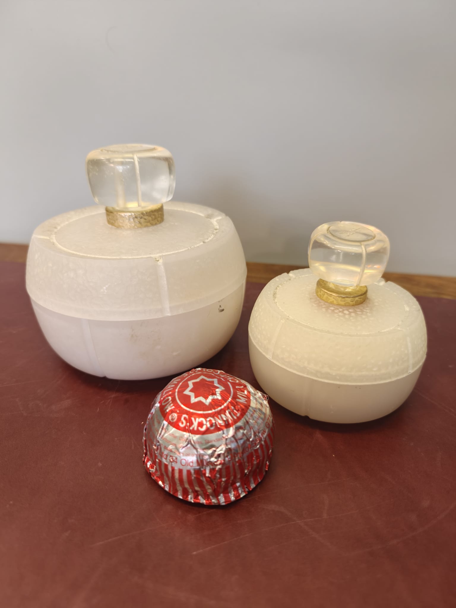 A Pair of Vintage Yves Saint Laurent Champagne Perfumed Bath and Vanity Containers