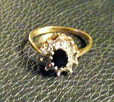 A 9ct gold fully marked Cluster Ring Set with Presumed Sapphire and diamonds1.77g approx . A 