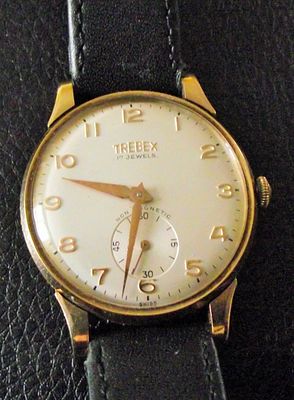 Vintage 9ct goldTrebex 17 Jewels Manual Wind Dress Watch on black leather strap. A vintage 