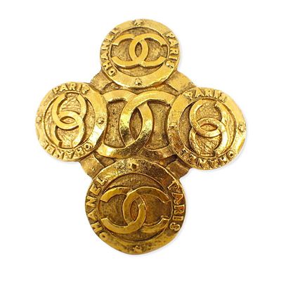 CHANEL Cross Brooch. catalog 

