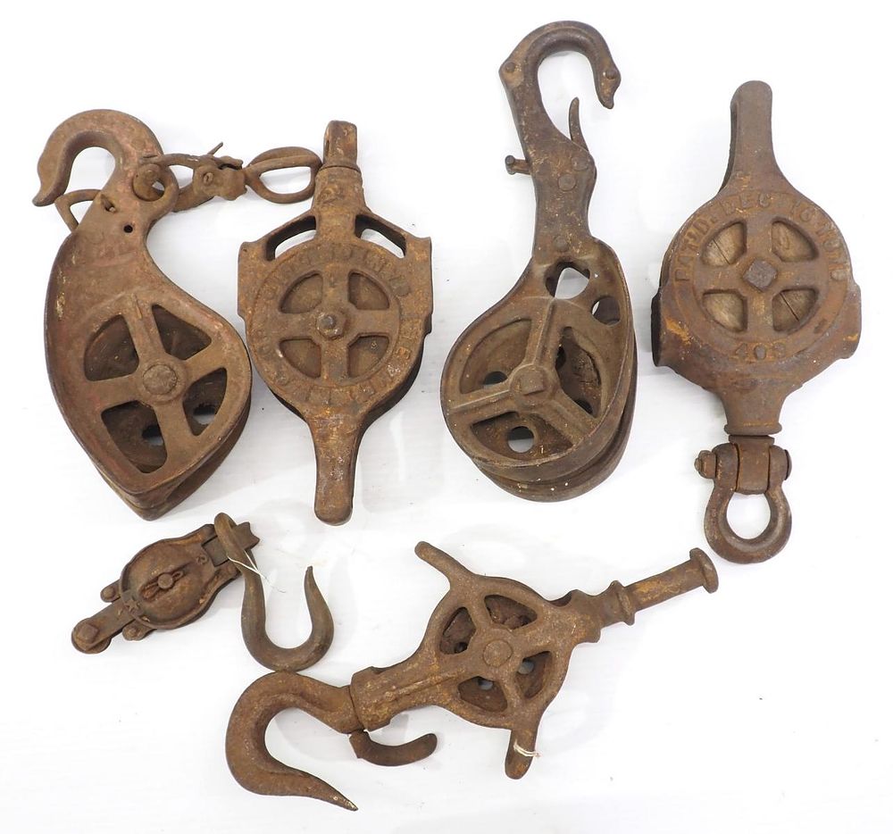 Lot 619: (6) Iron pulleys including (2) Ney & a Louden