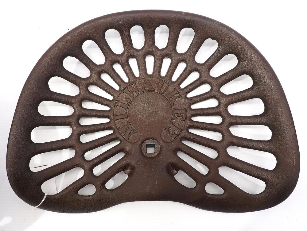 Lot 776: Milwaukee cast iron seat