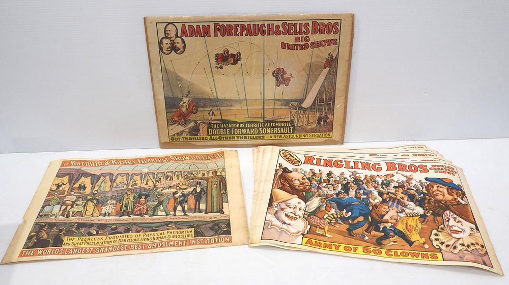 Lot 1189: (7) 13"x19" paper Ringling Bros "Army of 50 Clowns" posters / (1) Adam Forepaugh & Sells Bros Big United Shows "Automobile Double Forward Somersault" / Barnum & Bailey Greatest Show on Earth "The Peerless Prodigies of Physical Phenomena"
