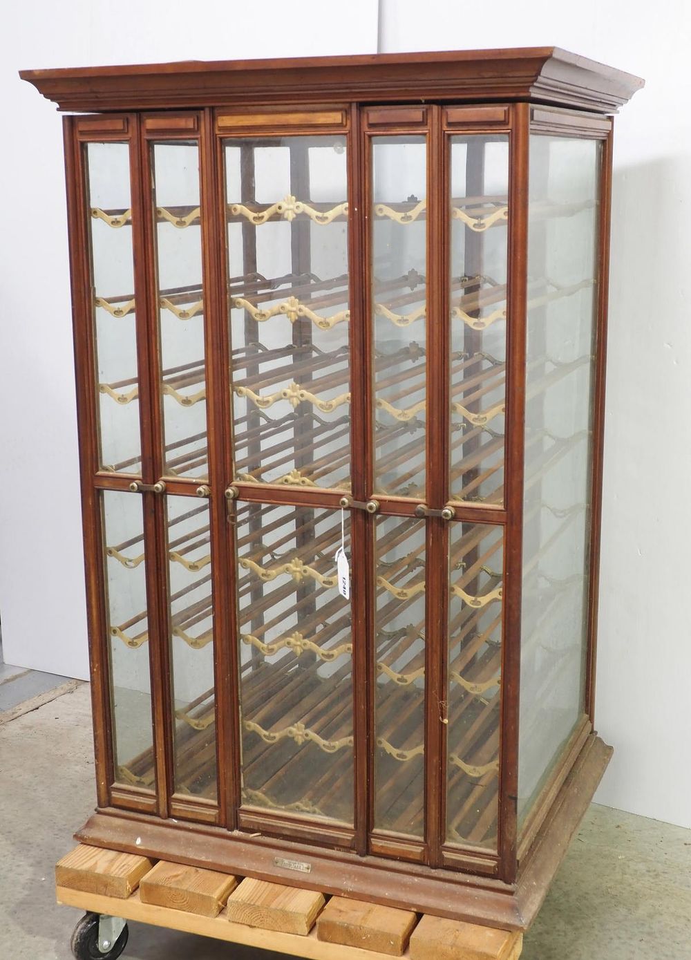 Lot 1240: Wood & glass floor model ribbon cabinet with 4 swinging doors, 29"x32"x49.5"H