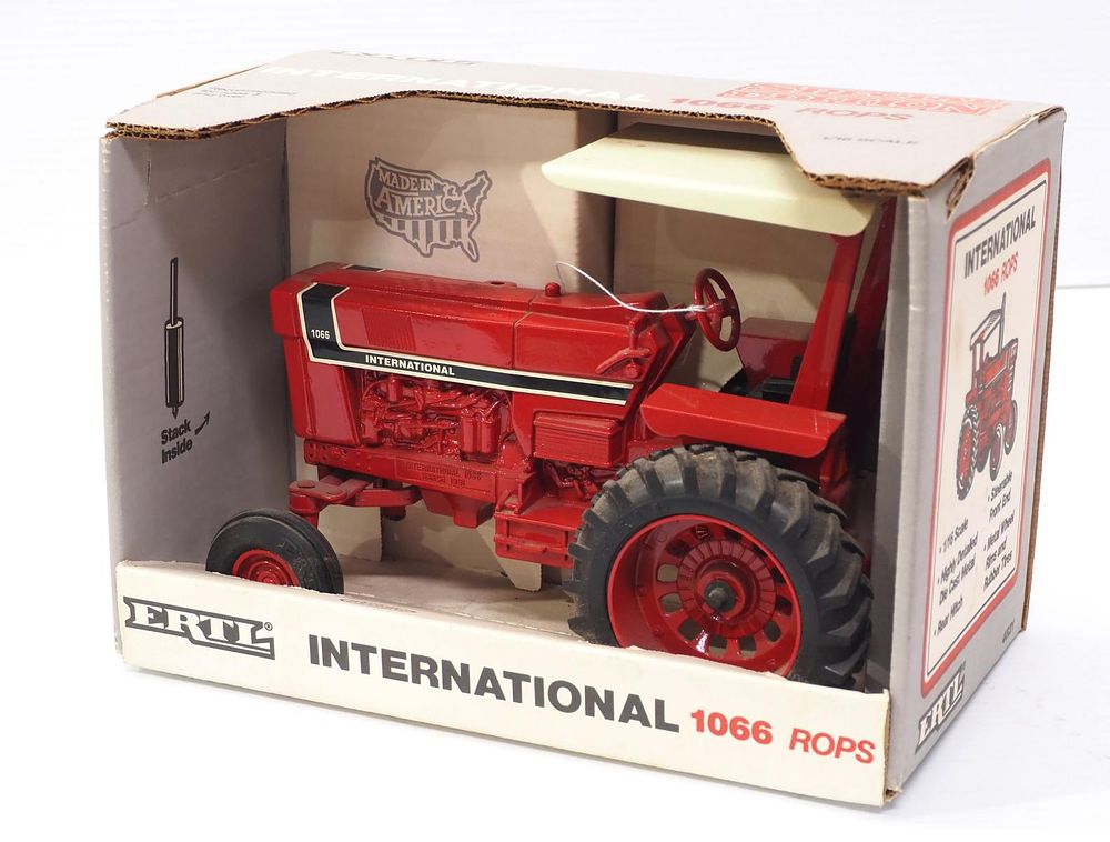 Lot 301: International 1066 with ROPS and box