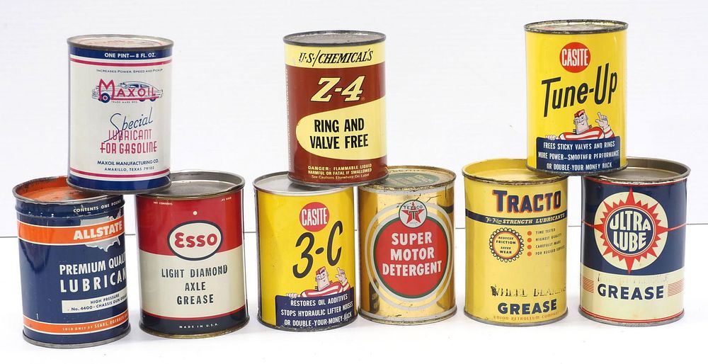 Lot 297: (9) Small cans of petroleum products