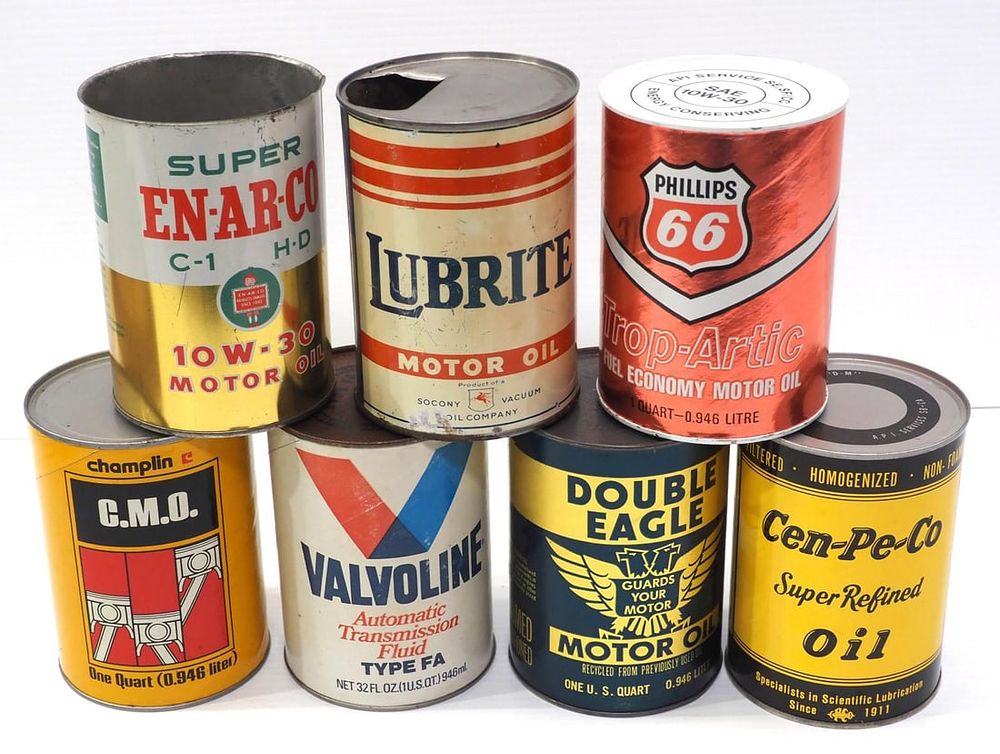 Lot 304: (7) 1-quart petroleum product cans