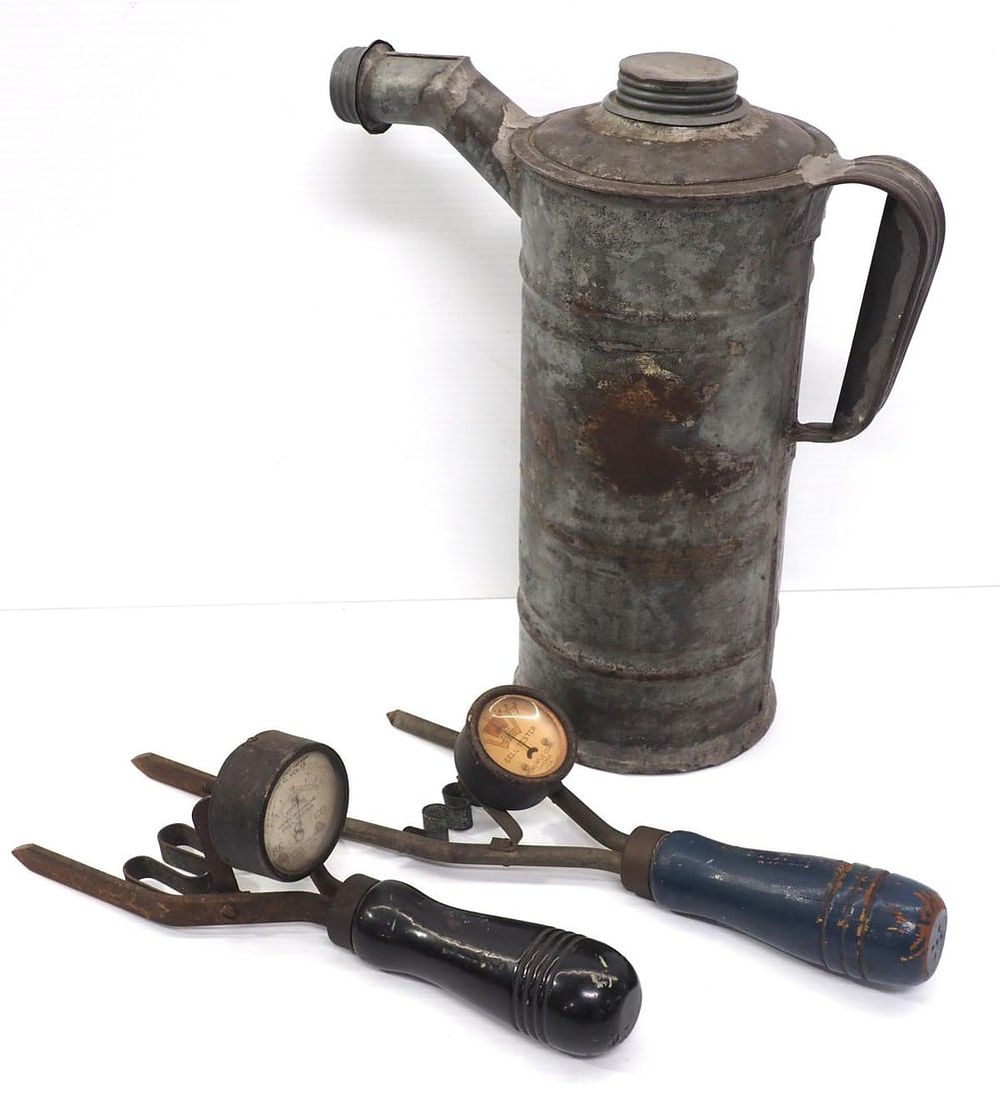 Lot 314: (2) Battery cell testers and tin fuel can