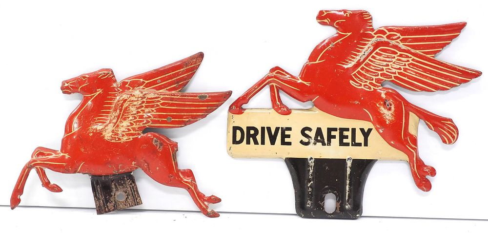 Lot 319: (2) Tin Pegasus license plate toppers