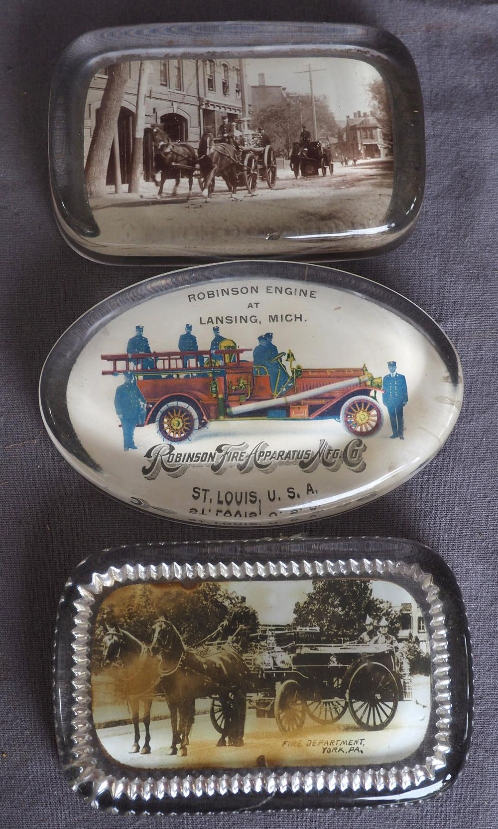 Lot 1185: (3) Glass fire-related paper weights