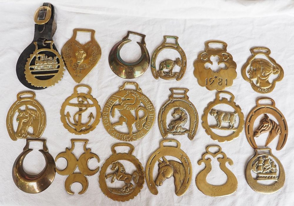 Lot 1207: (18) Brass harness ornaments