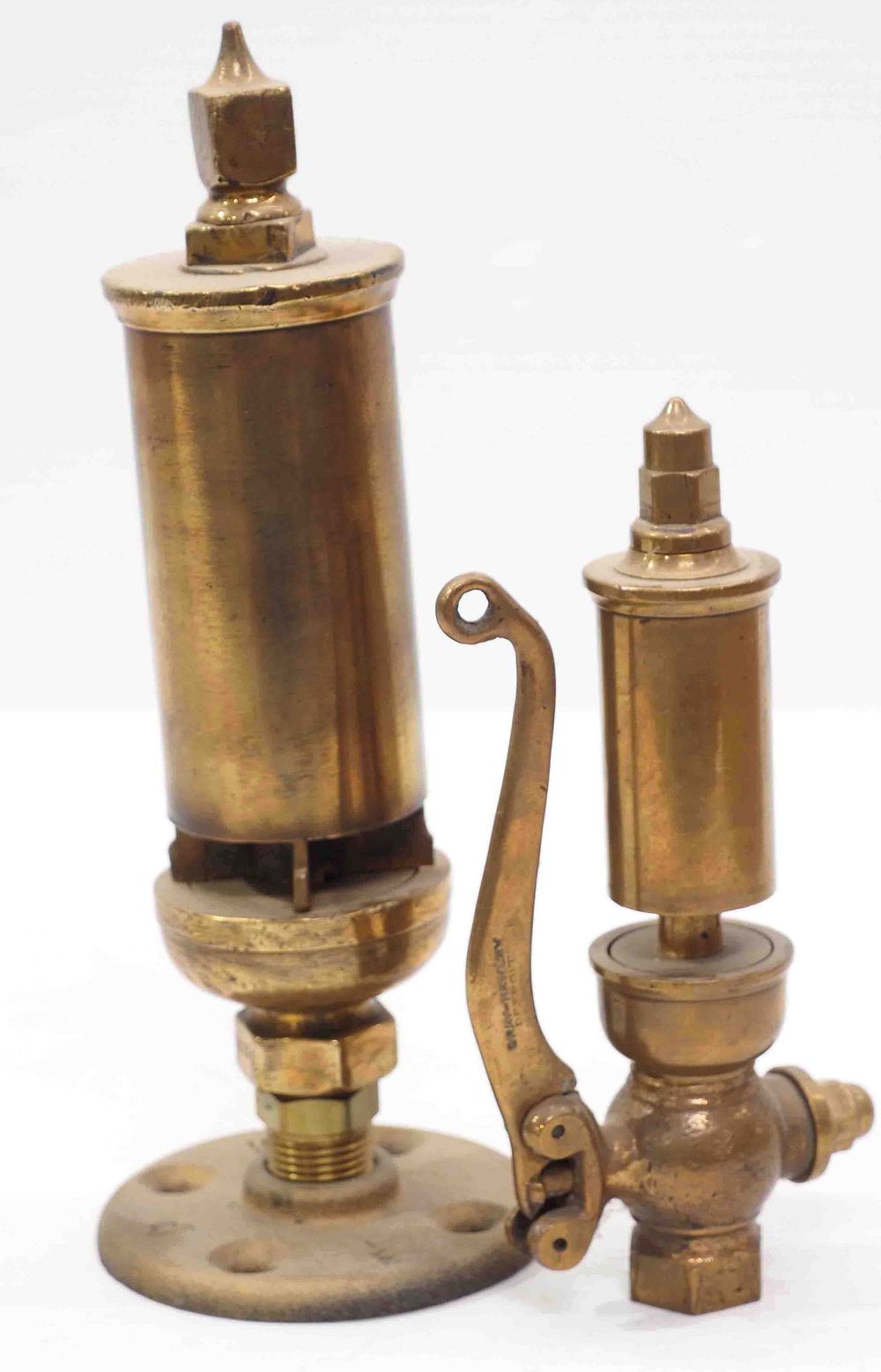 Lot 1166: (2) Small brass steam whistles
