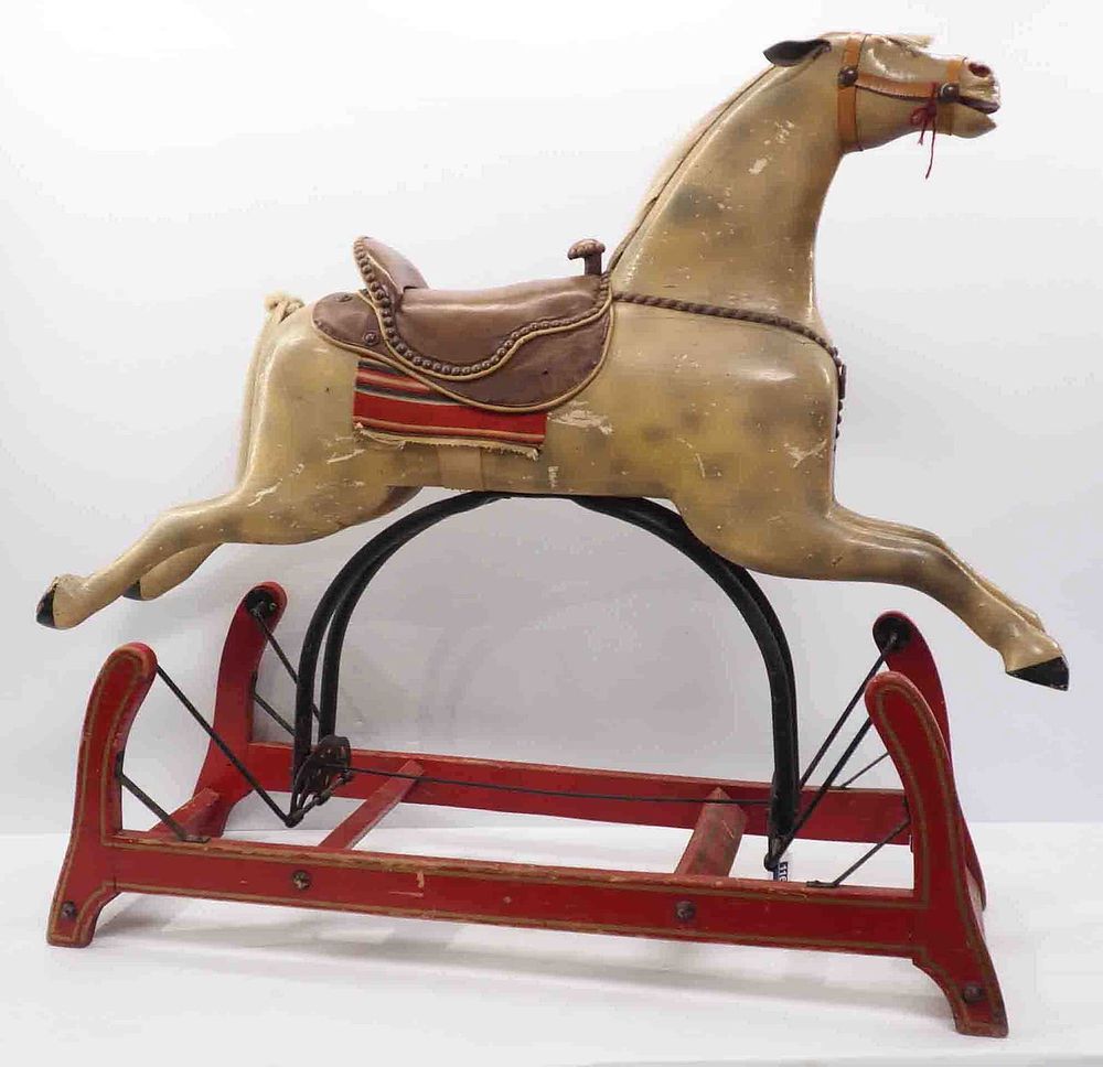 Lot 1168: Early wooden riding horse