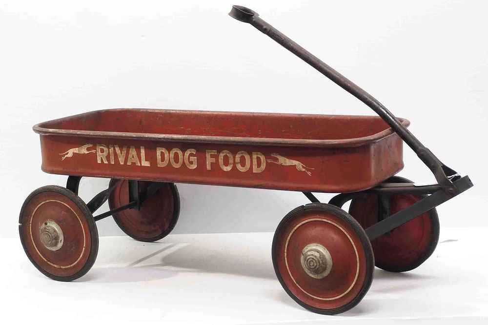 Lot 1296: Metal child's wagon advertising Rival Dog Food