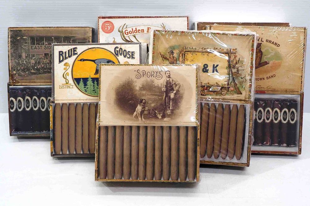 Lot 1298: (7) Wooden cigar boxes with colorful labels