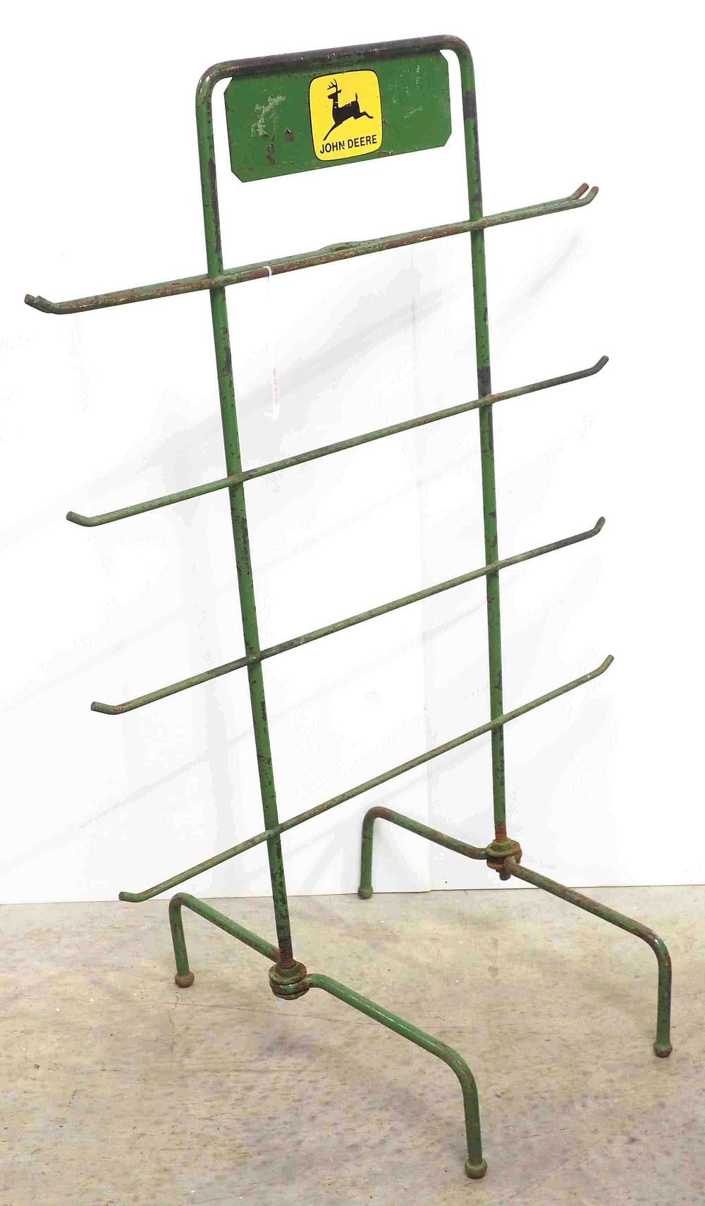 Lot 175: John Deere metal product display rack