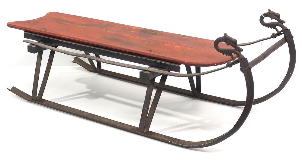 Lot 337: Cast iron & wood child's sled with swan heads