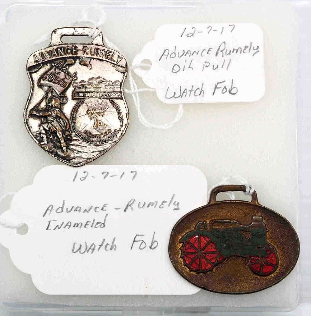 Lot 384: (2) Advance Rumely watch fobs