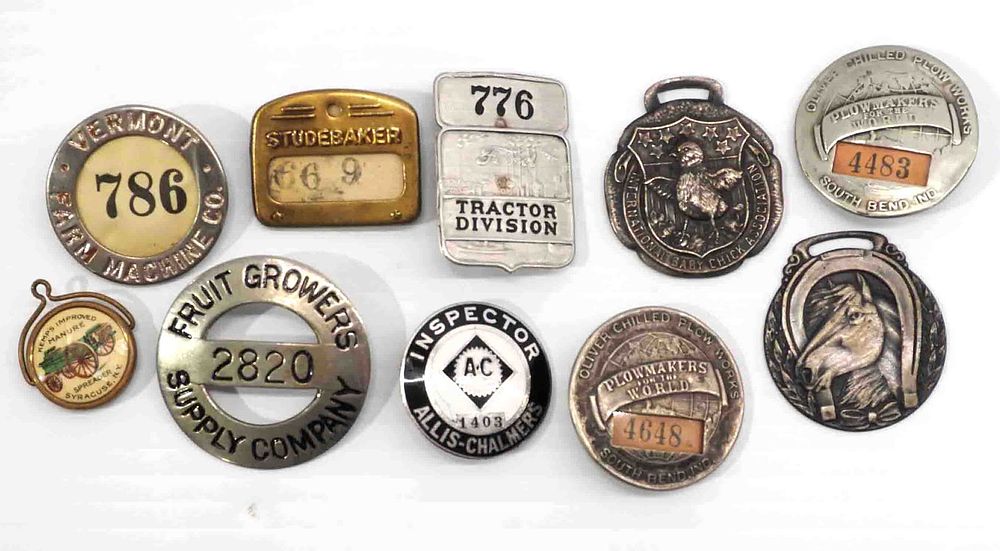 Lot 395: Employee badges and watch fobs