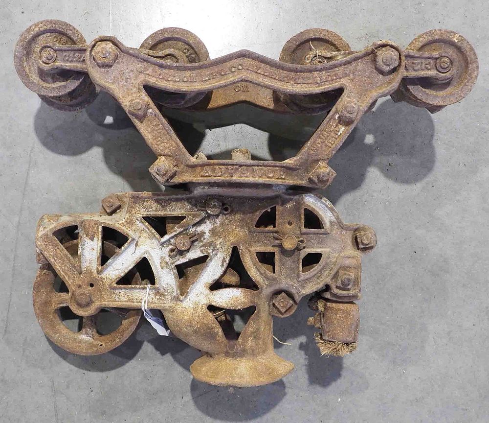 Lot 619: Olson 8-wheel steel track hay trolley