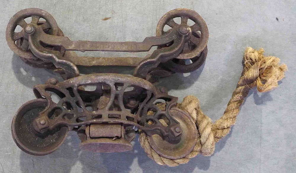 Lot 841: Early Myers 4" swivel steel track hay trolley
