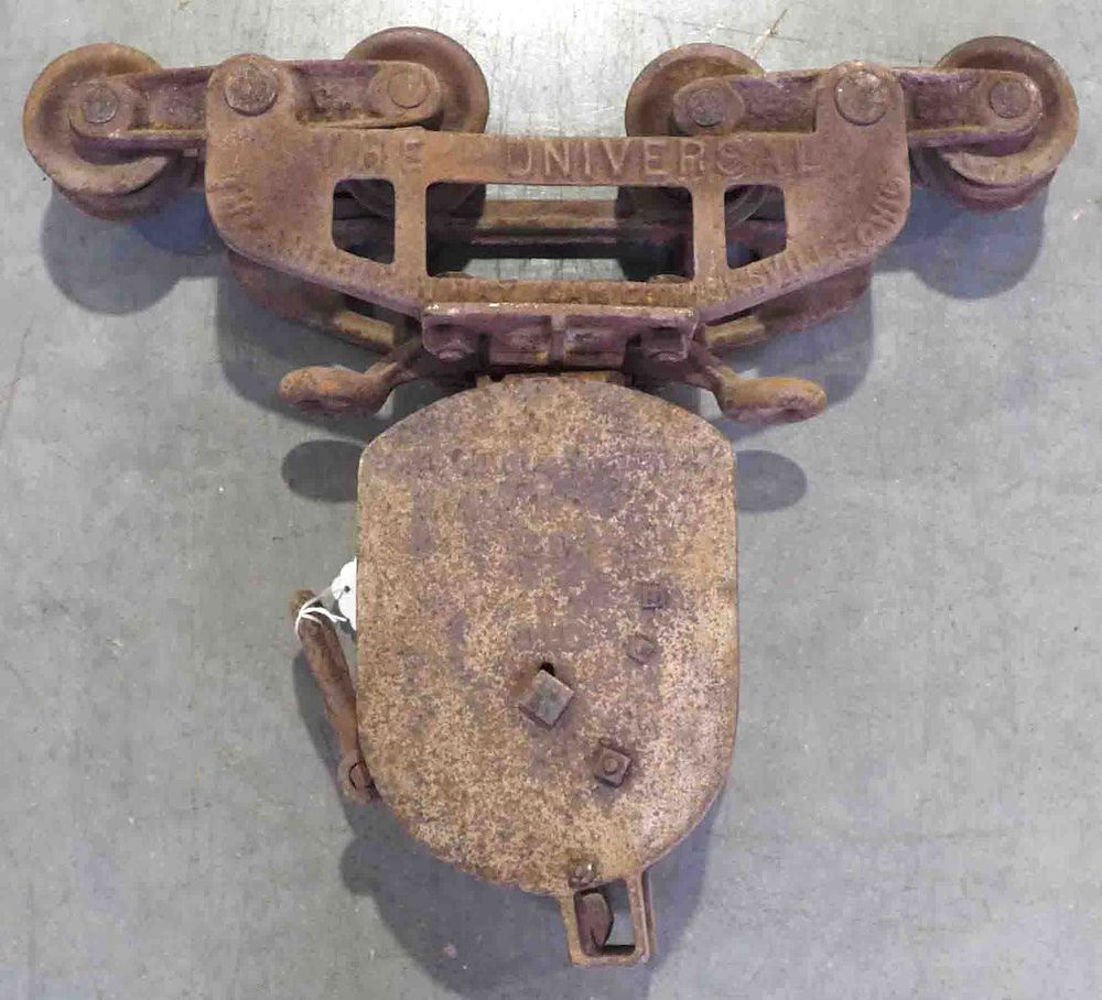 Lot 883: Universal hay trolley Co. steel track hay trolley