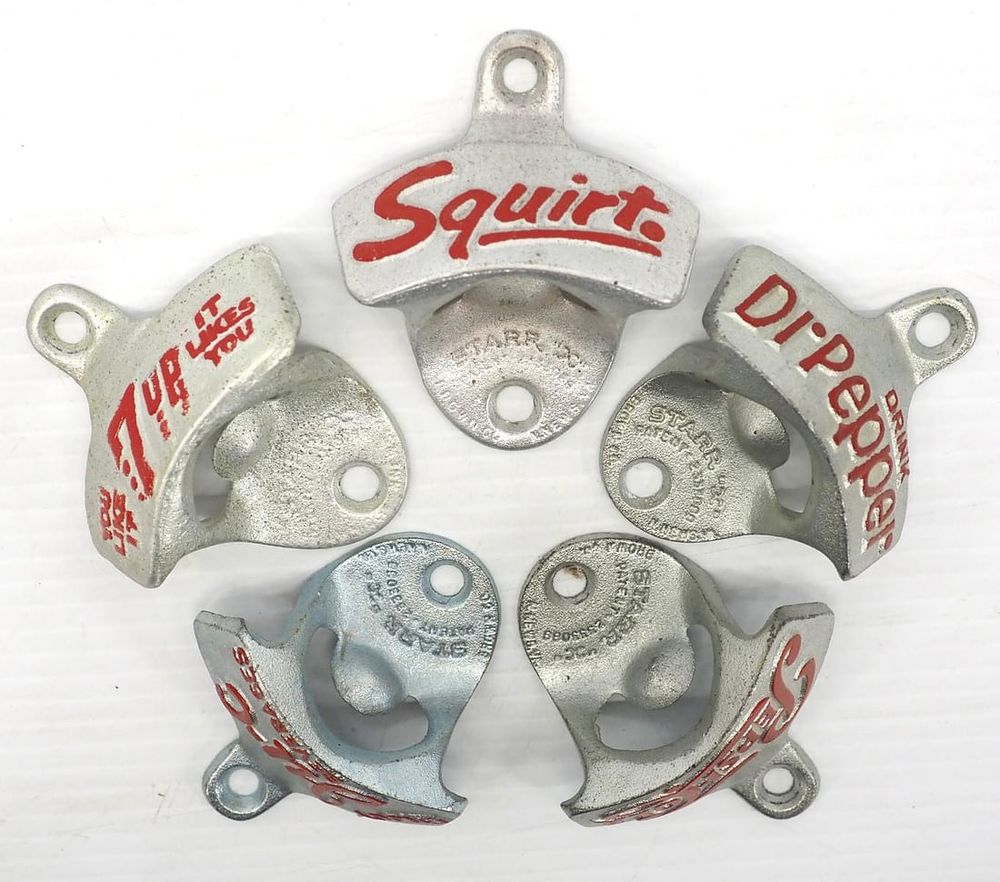 Lot 297: (5) Bottle openers