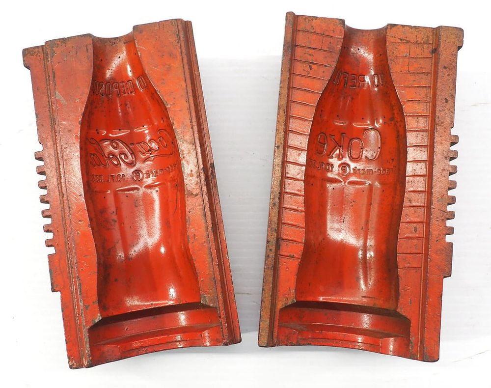 Lot 1393: 2-pc cast iron Coca Cola factory bottle mold