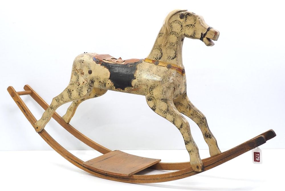 Lot 179: Early wooden rocking horse