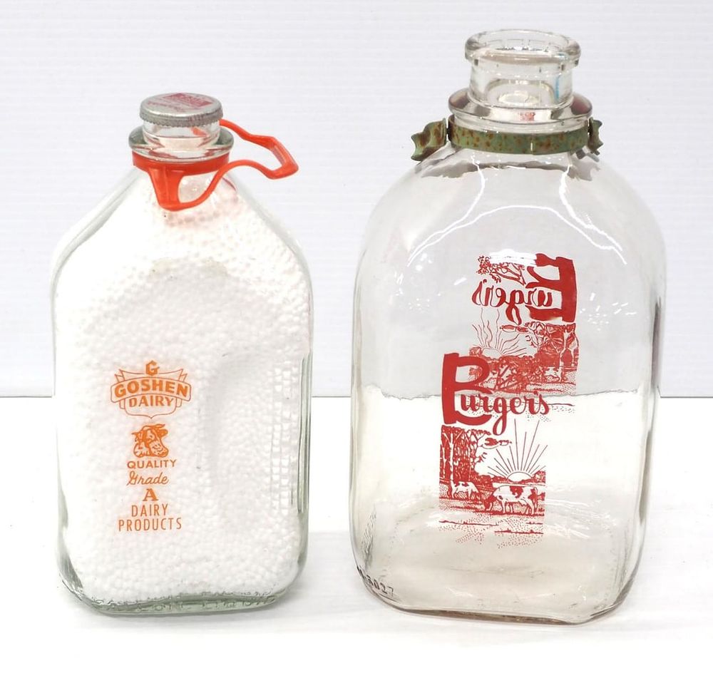 Lot 280: (2) Glass milk jugs