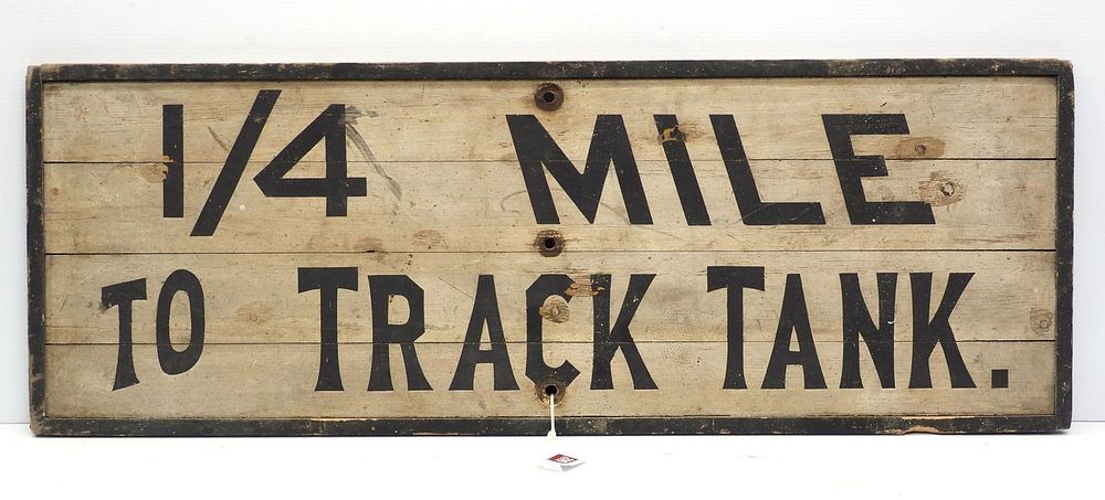 Lot 290: 1/4 Mile To Track Tank sign