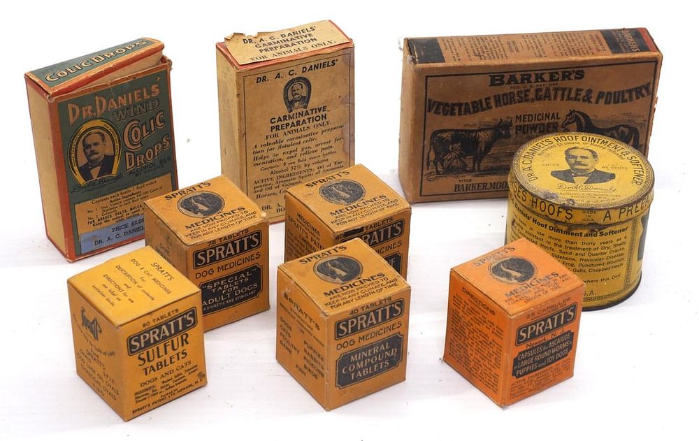 Lot 315: (9) Country store livestock product containers